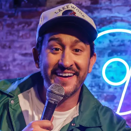 DanDavies Comedian Dan Davies performing on stage at LMAOF: New York.