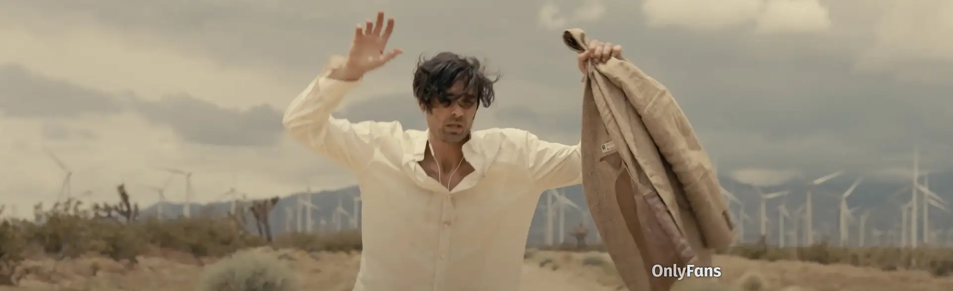 Still from the All-American Rejects new video "Easy Come, Easy Go" — singer Tyson Ritter poses with his arms up