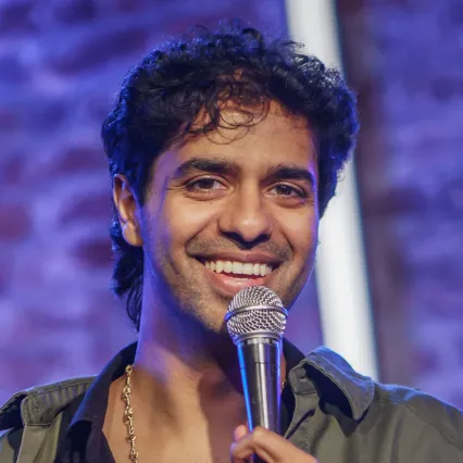 RazaJafri Comedian Raza Jafri performing on stage at LMAOF: New York.