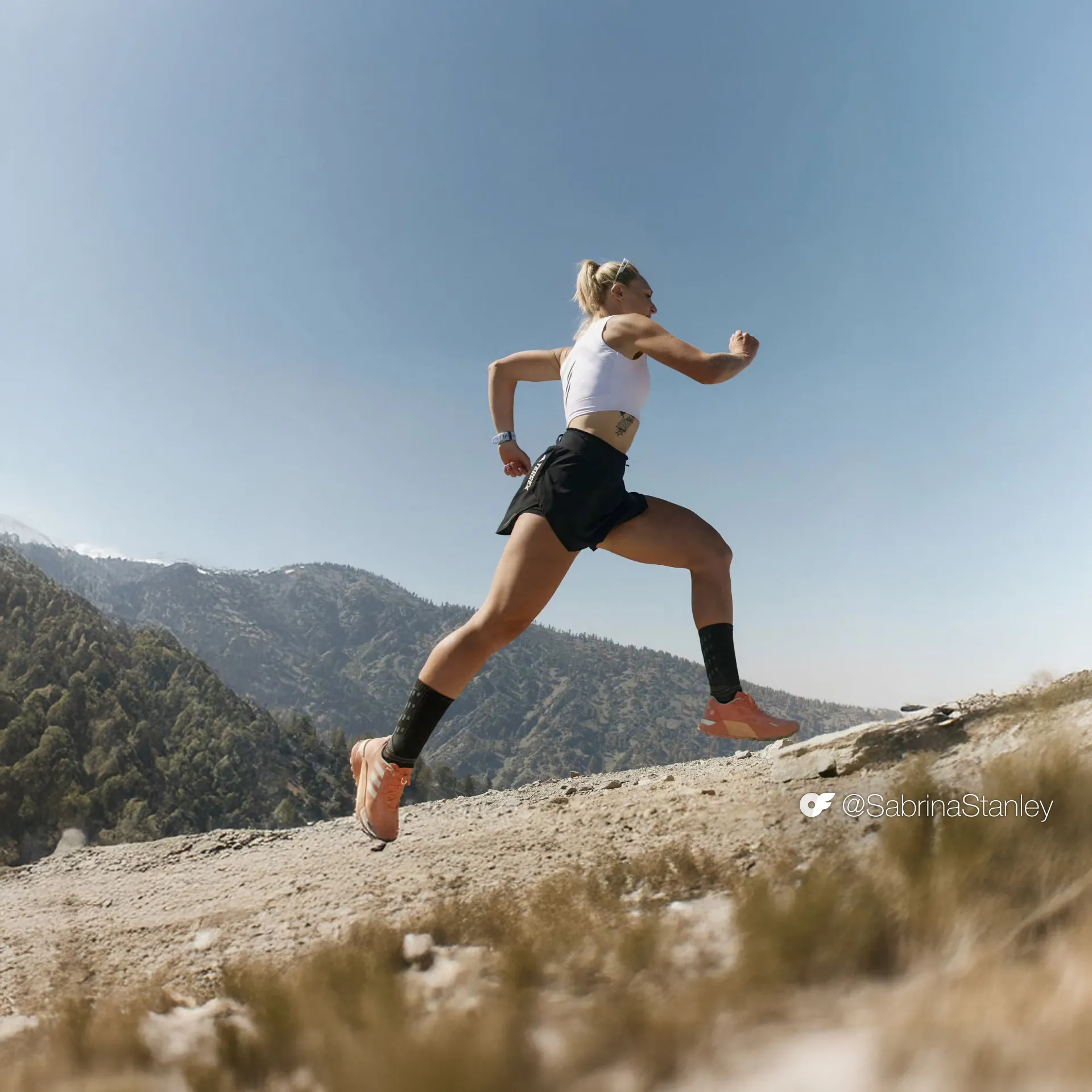 Sabrina_AllScreenSizes_1920x1920 Graphic 5 V 3 Photo of Sabrina Stanley on a run