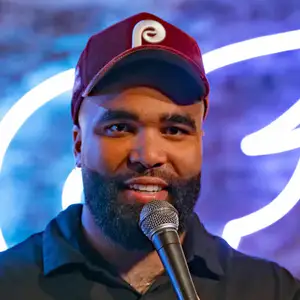 Comedian Colin "Cab" Washington poses on stage at LMAOF 111 in New York
