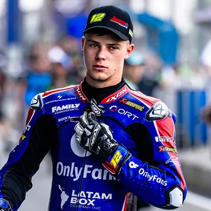 Filip Salač, professional Moto2 racer wearing his OnlyFans American Racing Team uniform and black baseball cap.