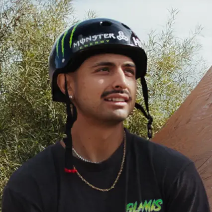 Daniel Sandoval Daniel Sandoval, professional BMX biker, is pictured in profile while wearing his black helmet.