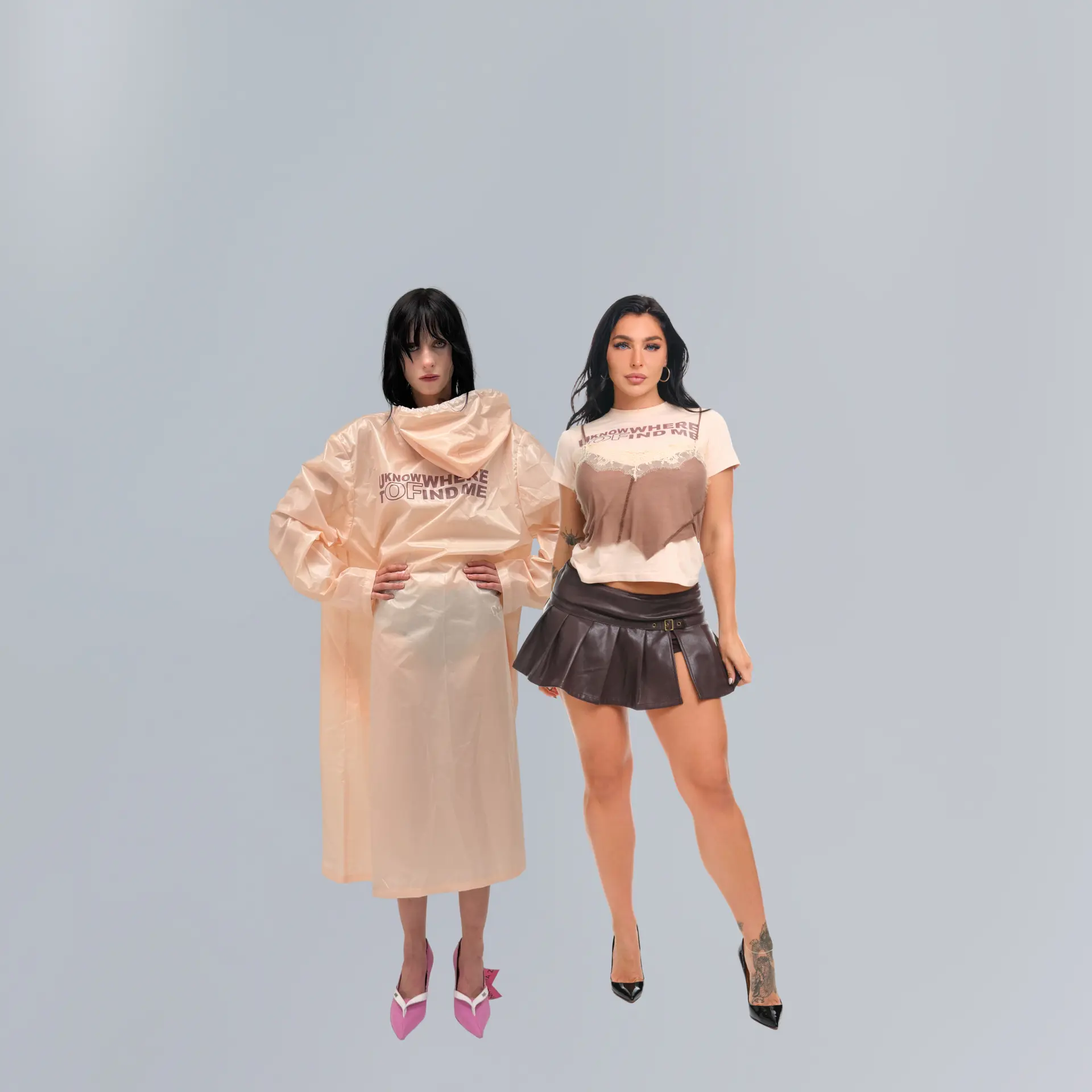 Emily Rinaudo models the Camisole Tee alongside a model wearing the transparent UKWTFM Coat from the Natasha Zinko x OnlyFans collection.